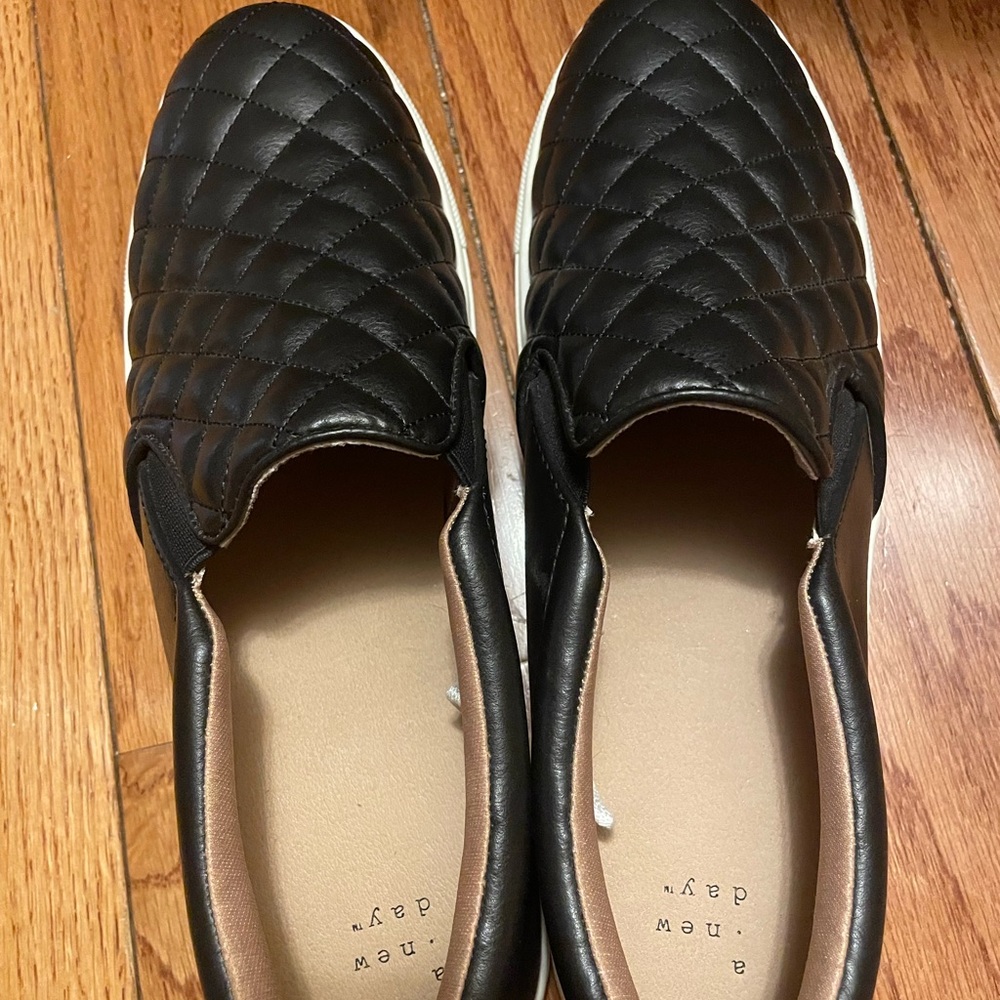 Brand new black slip on shoes